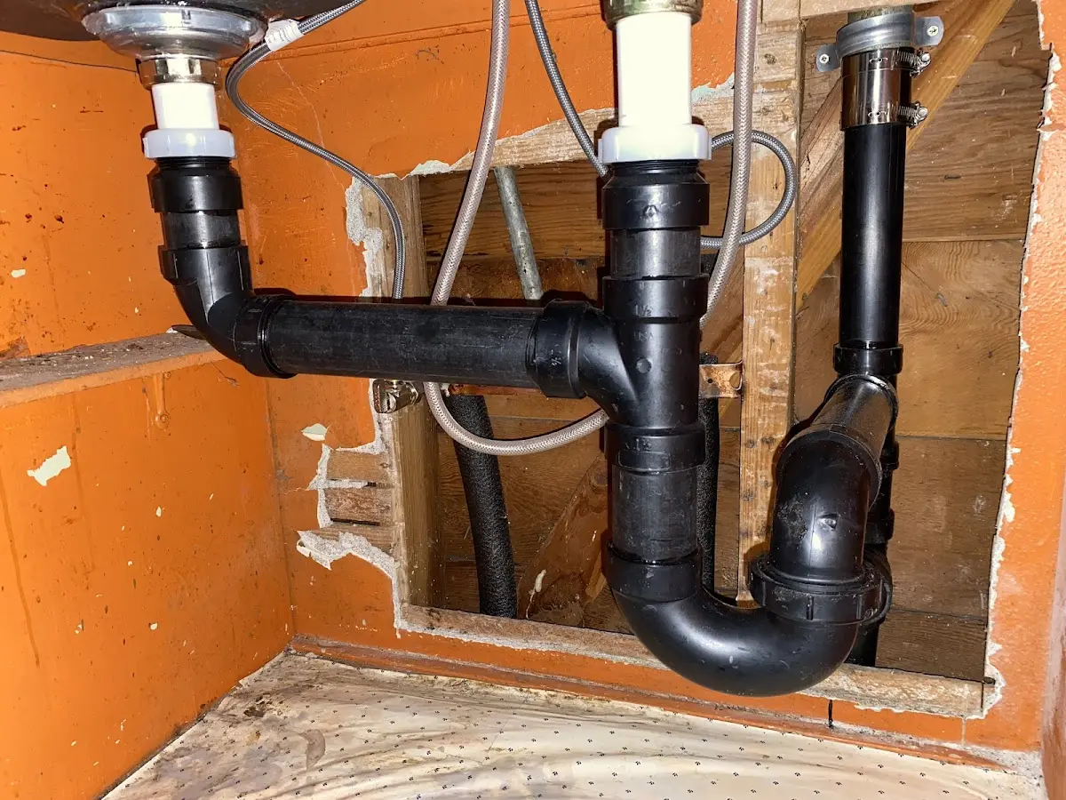 Professional Garbage Disposal Repair equipment and tools on the job in Amwell